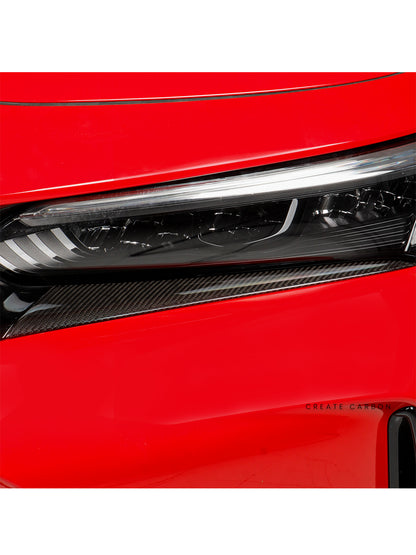 Dry carbon fiber front headlight eyebrow covers installed on red Honda Civic Type R FL5